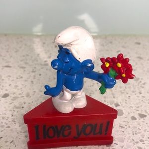 Vintage 1980s Bashful Smurf figure toy with stand